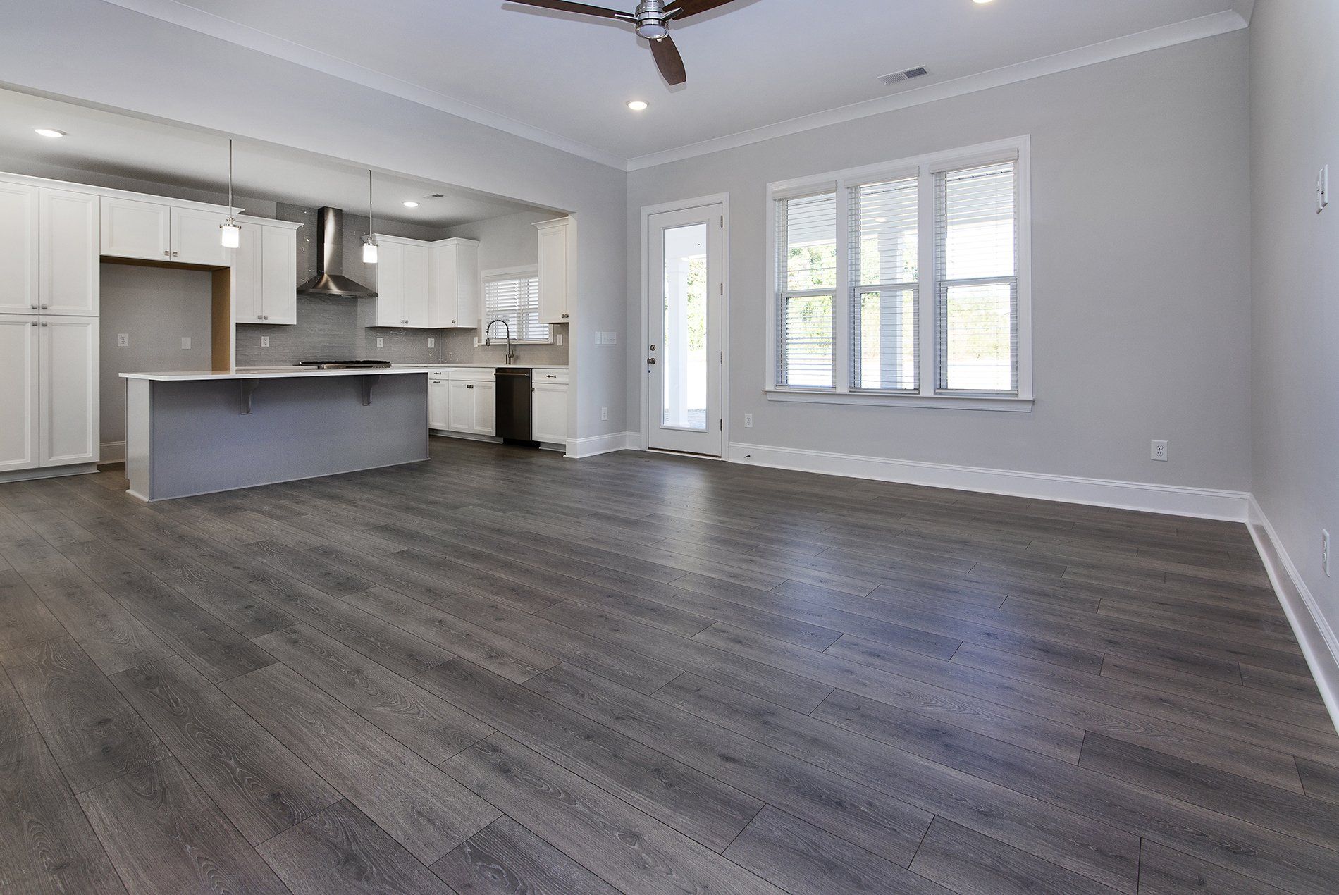 photo of the Kingston Plan by RyKar Homes - great room to kitchen