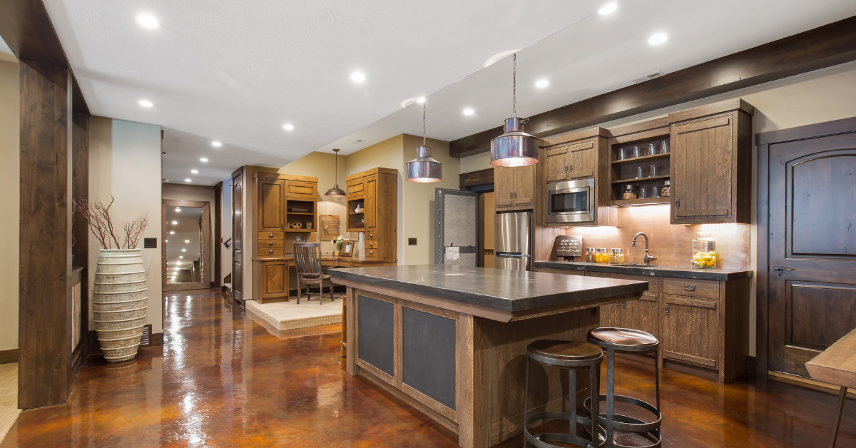 There is a large island in the middle of the kitchen.