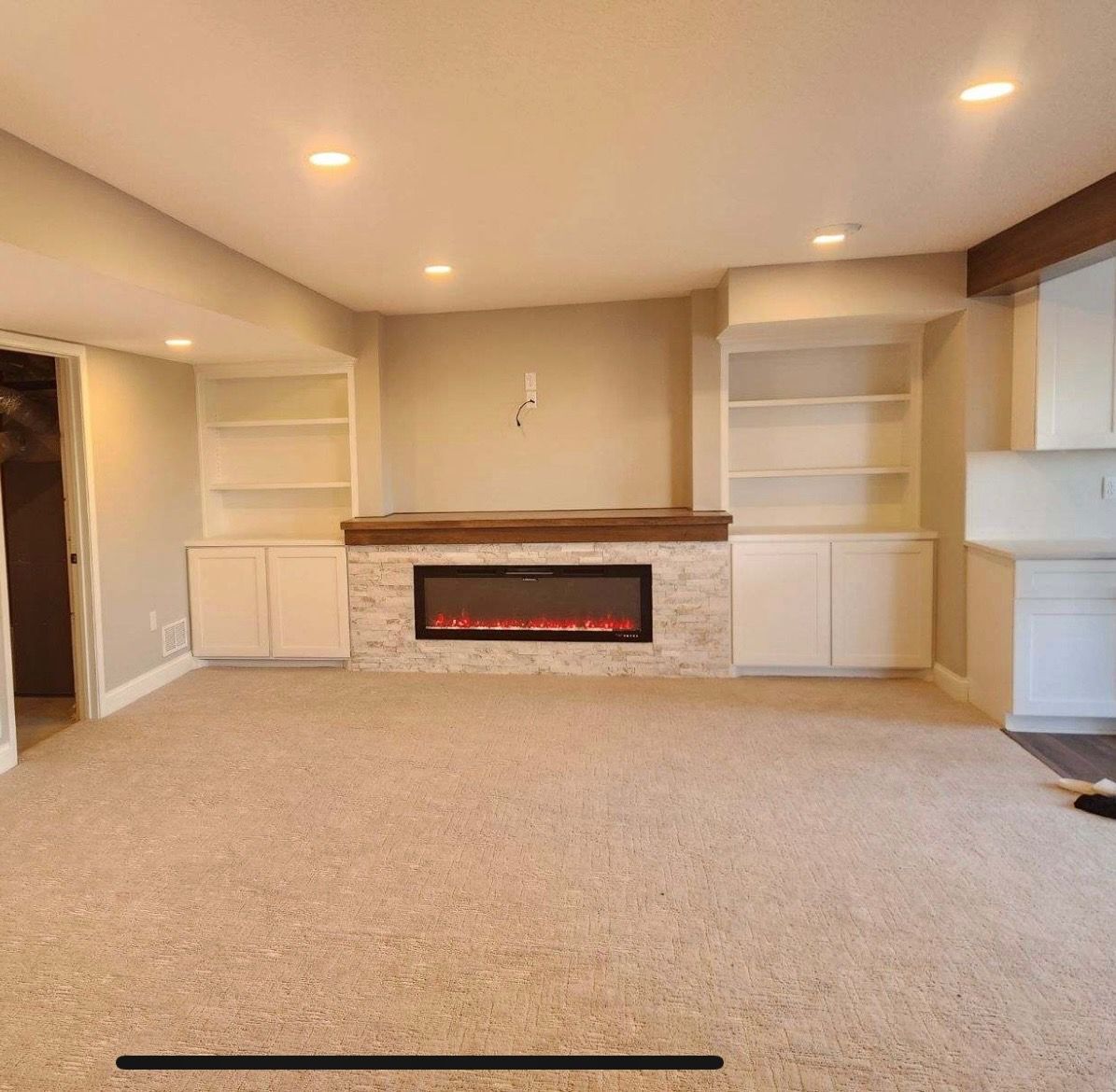 There is a fireplace in the middle of the room.
