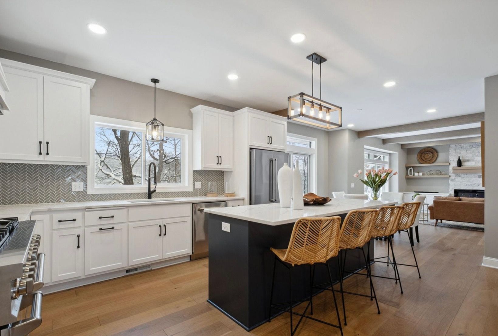 There is a large island in the middle of the kitchen.