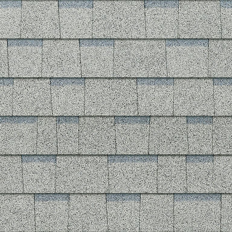 A close up of a roof with shingles on it.