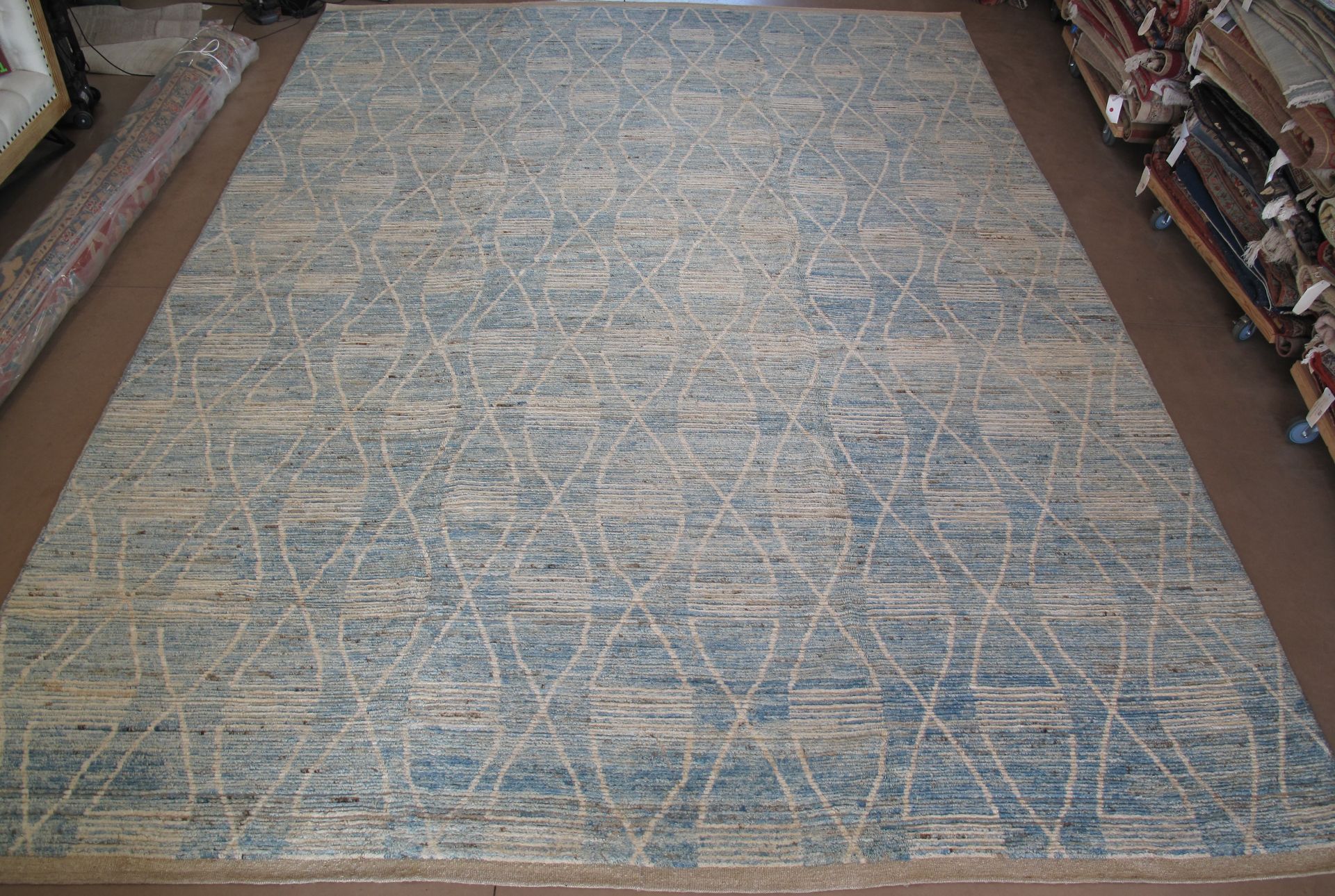A close up of a rug with a pattern on it.