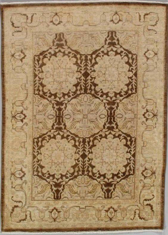 A rug with a pattern that looks like a quilt