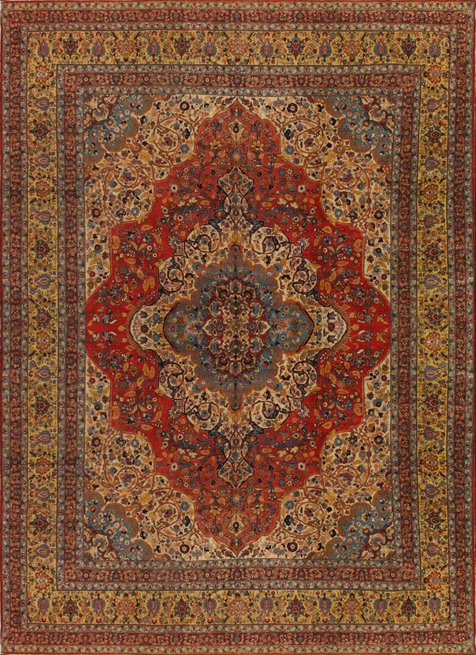 A close up of a rug with a floral pattern on it.