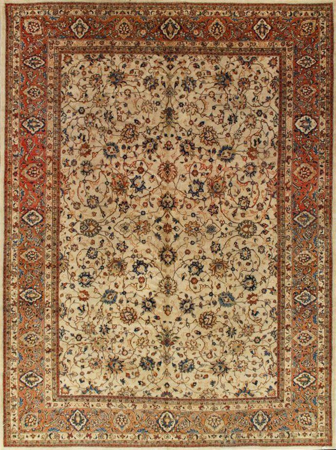A rug with a floral pattern on it is sitting on a table.