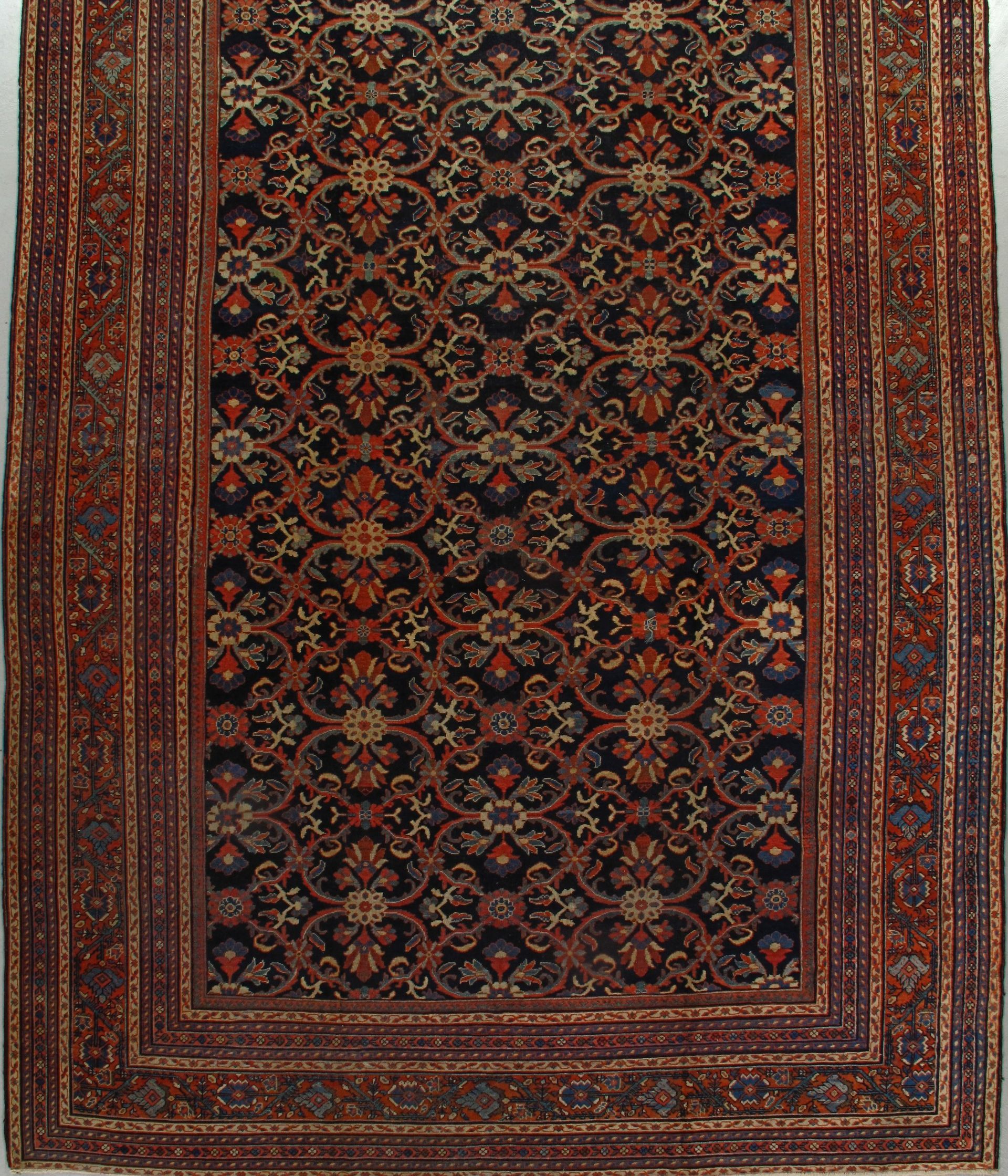 A rug that has a floral pattern on it