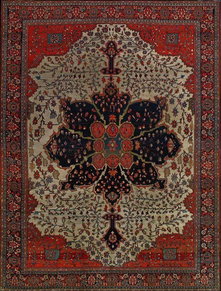 A close up of a rug with a floral pattern on it.