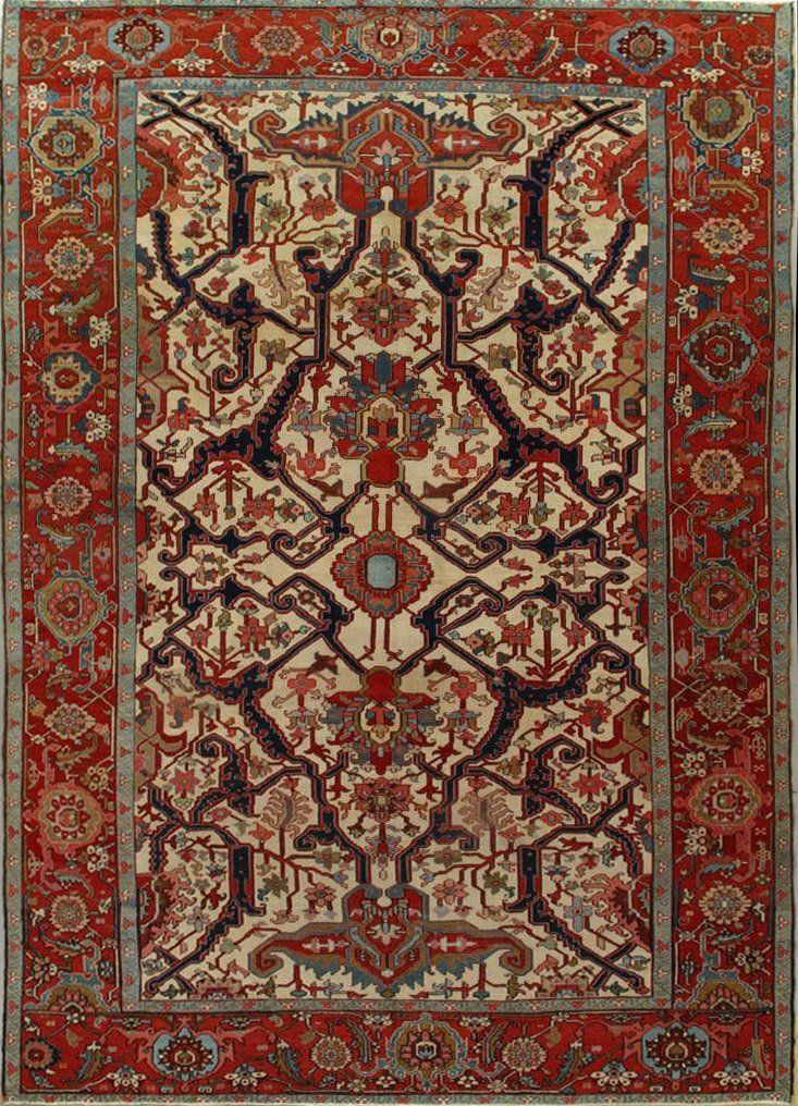 A red and white rug with a floral pattern on it.