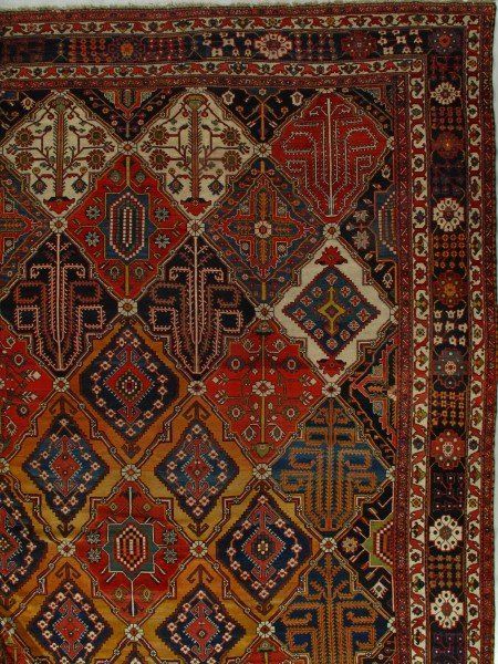 A close up of a rug with a geometric pattern