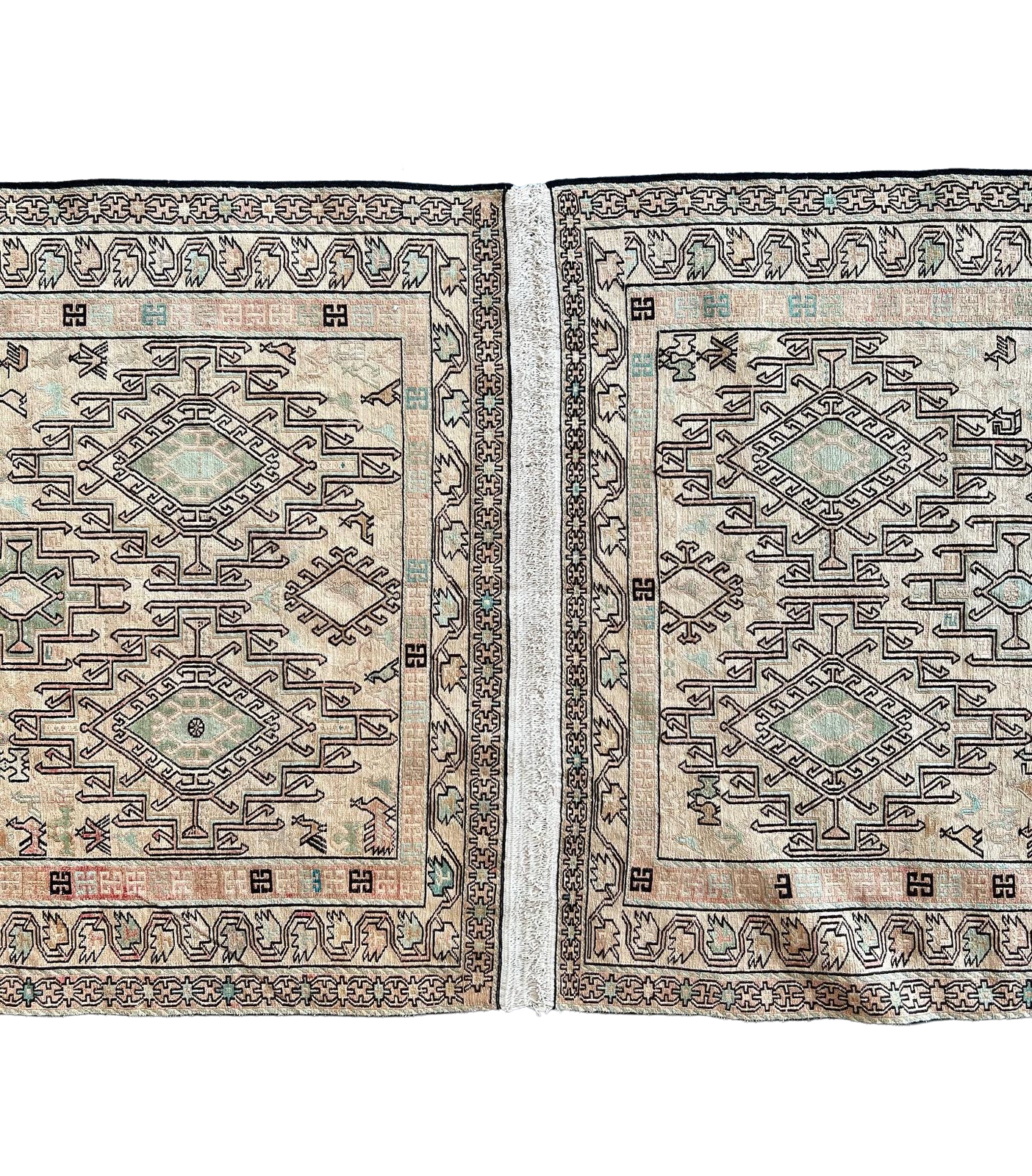 A rug with a pattern on it is on a white background.