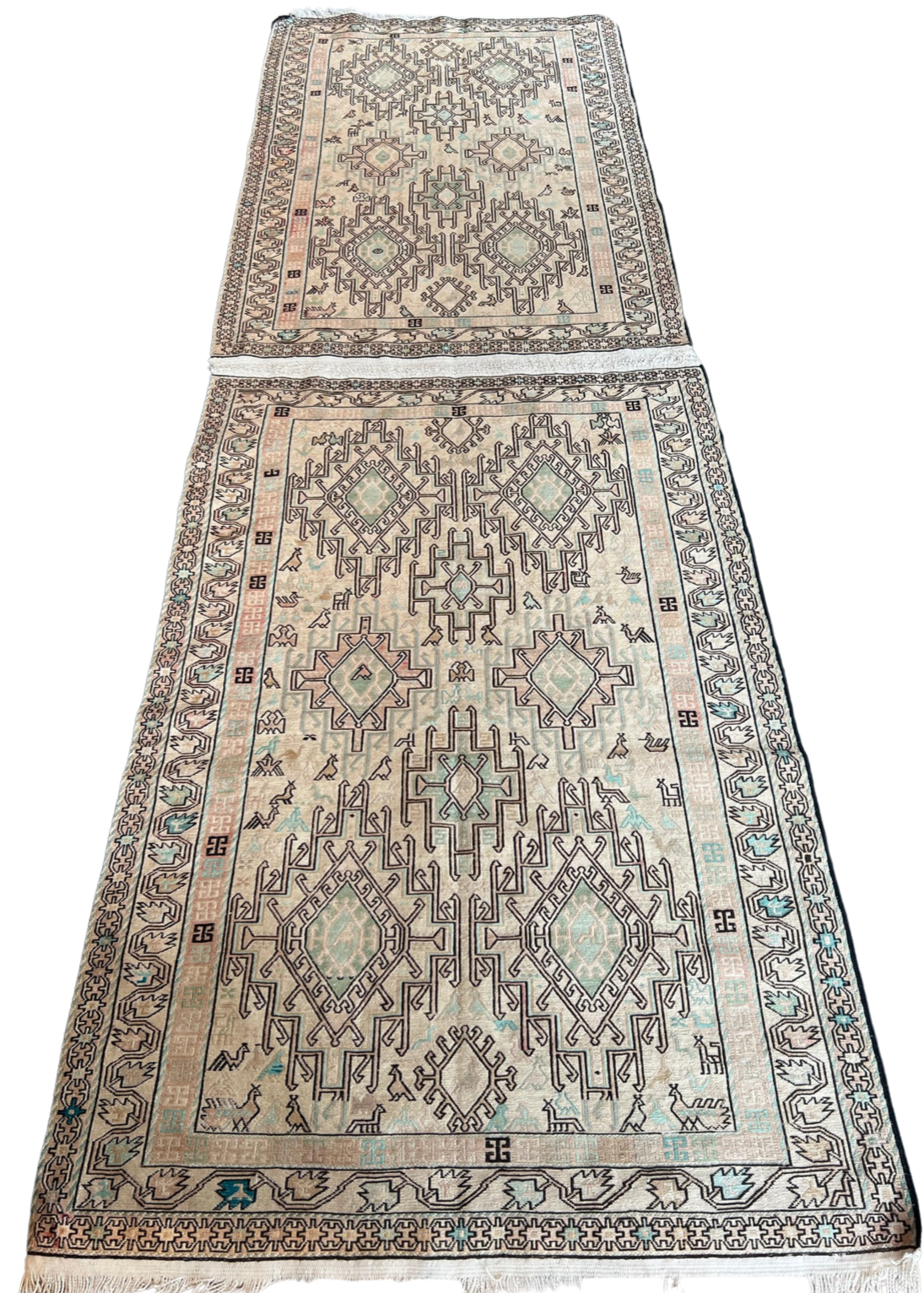 A rug with a pattern on it is on a white background.