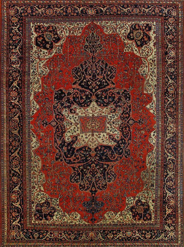 A red and gold rug with a floral pattern on it.