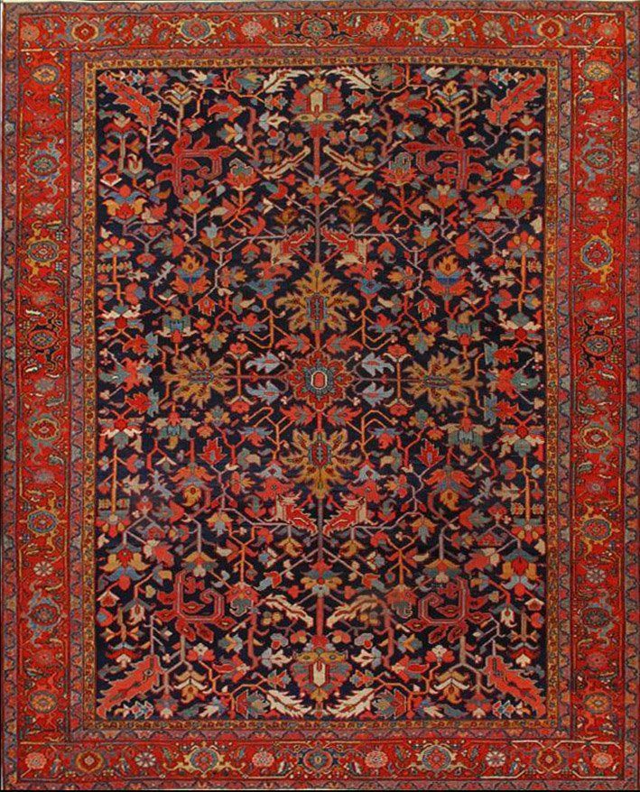 A red and black rug with a floral pattern on it