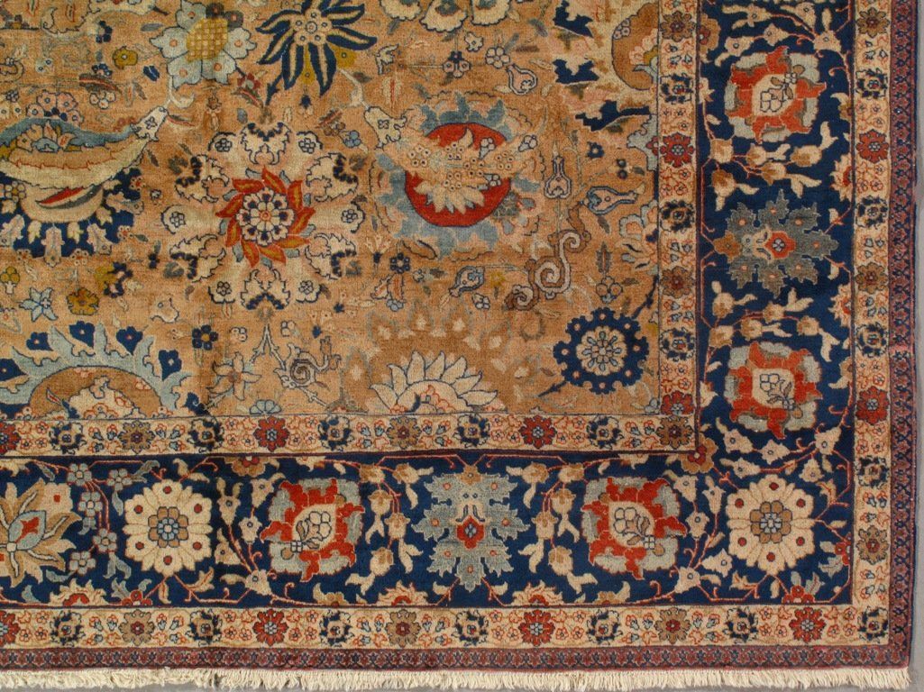 A close up of a rug with a floral pattern on it