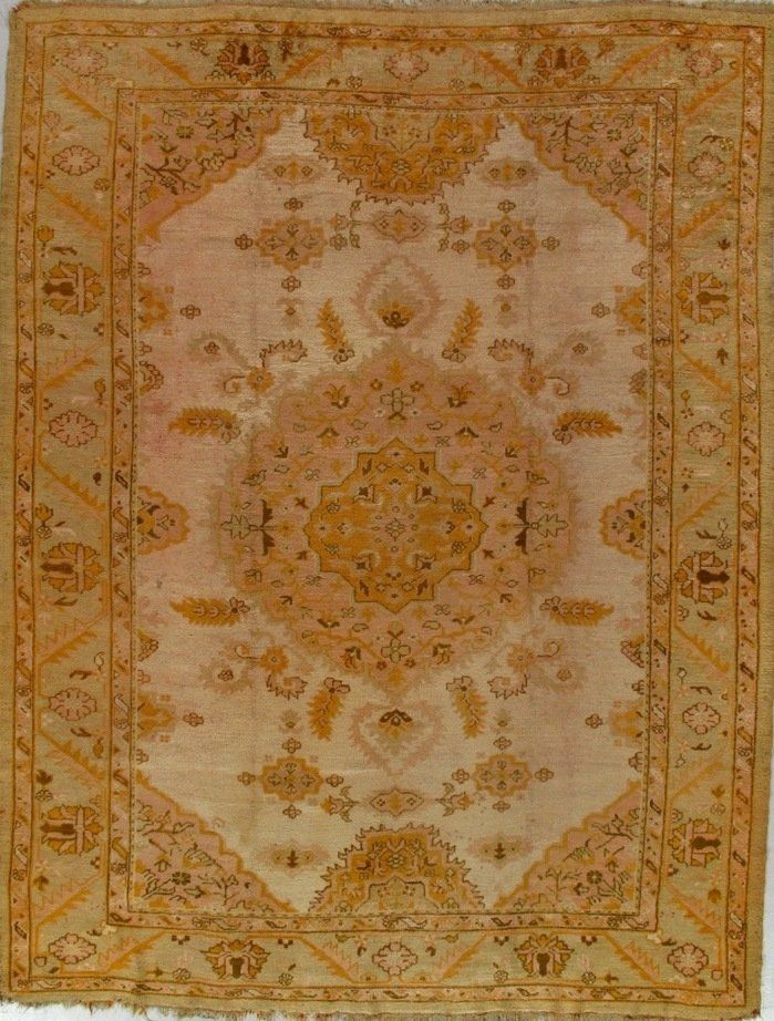 A rug with a yellow and white pattern on it
