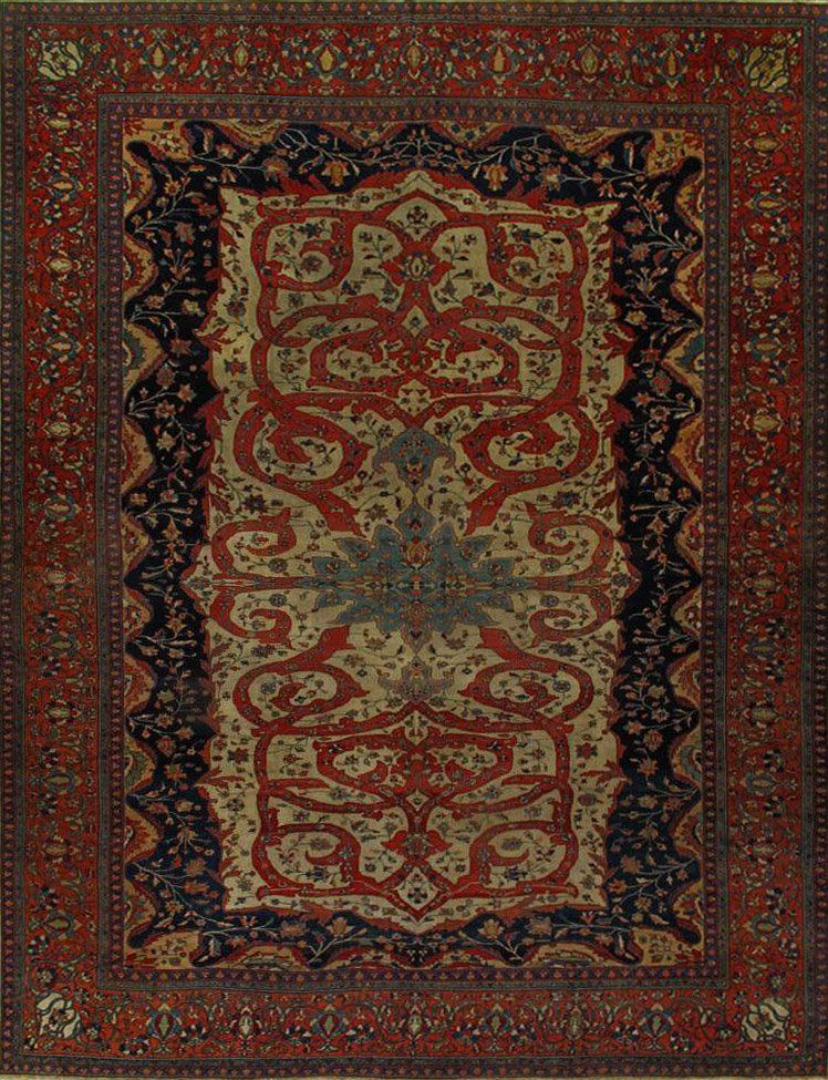 A red and black rug with a floral pattern on it