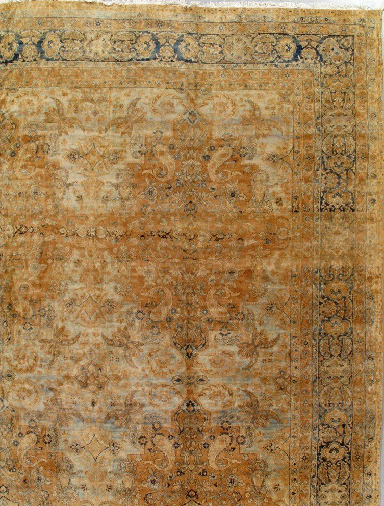A close up of a rug with a pattern on it.