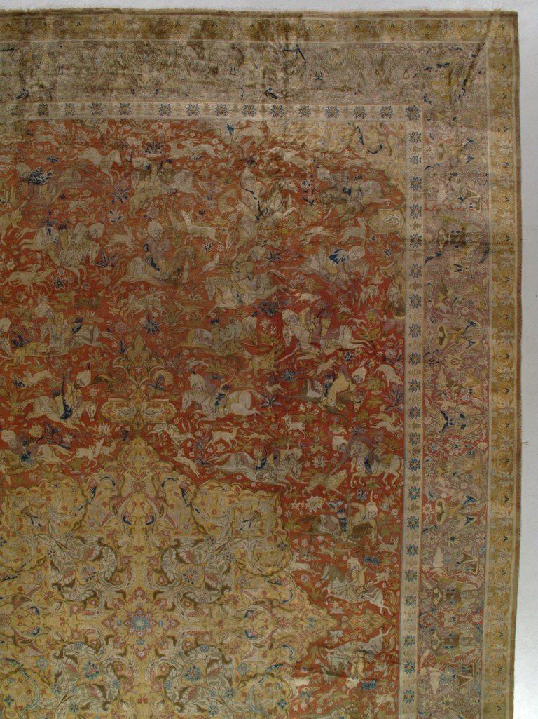 A close up of a rug with a floral pattern on it