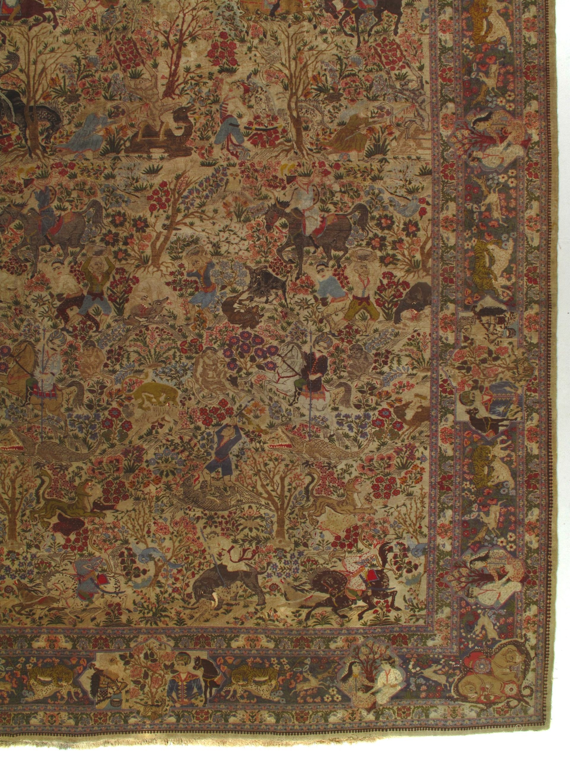 A rug with a floral pattern and animals on it