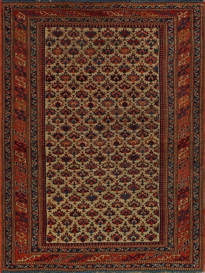 A rug with a pattern on it is sitting on a table.