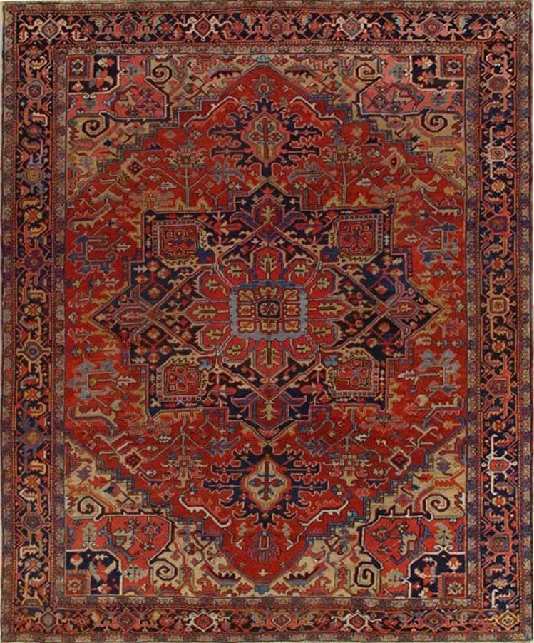 A red rug with a geometric pattern on it