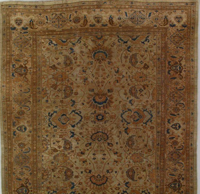 A rug with a floral pattern on it is on a white background.