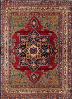 A red rug with a floral design on it