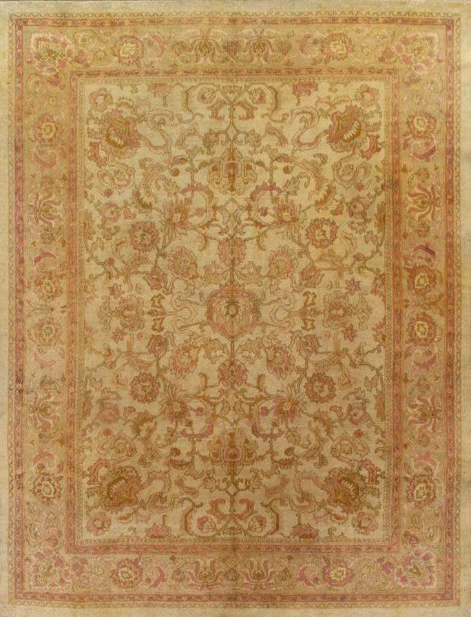 A close up of a rug with a floral pattern on it.