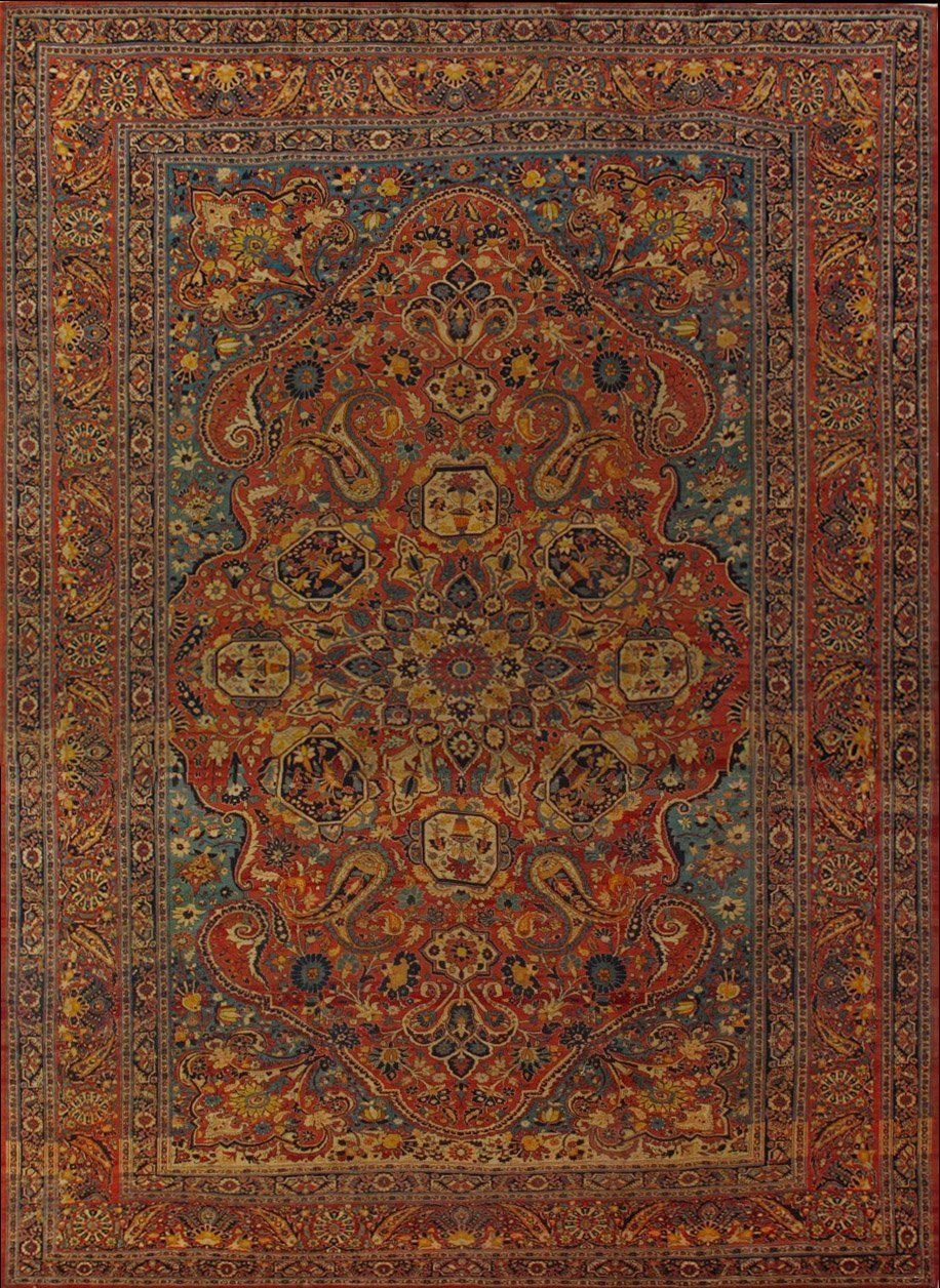 A close up of a rug with a floral pattern on it.