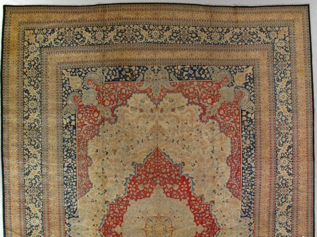 A rug with a floral pattern on it is sitting on a table.