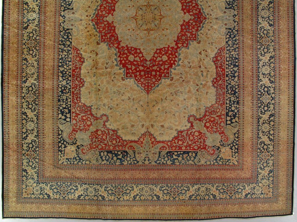 A rug with a floral pattern on it is sitting on a table.
