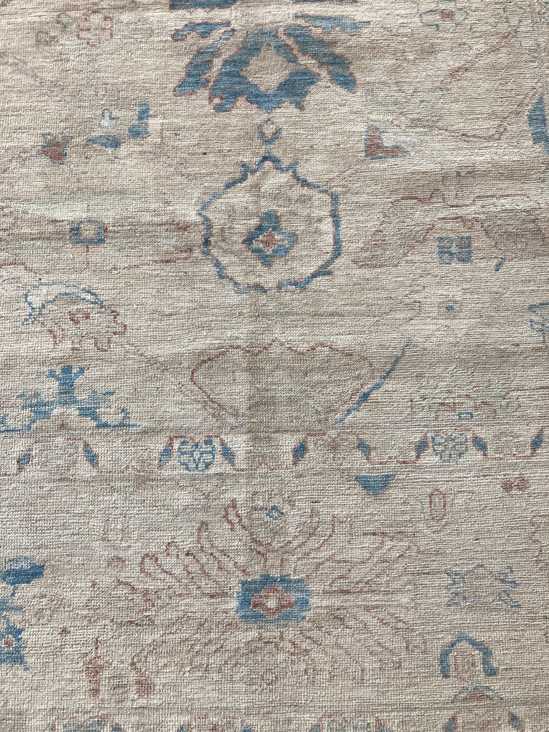 A rug with a pattern on it is on a white background