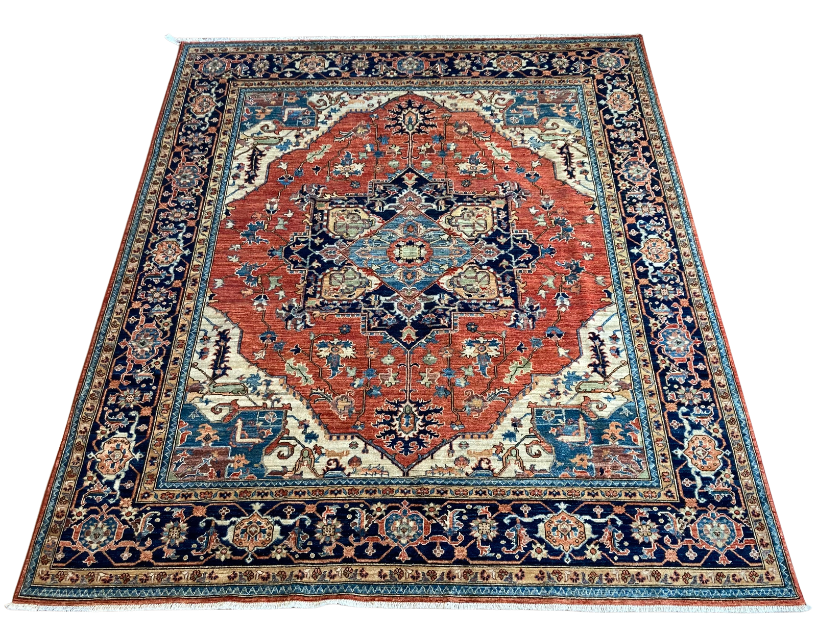 A red and blue rug with a floral pattern on a white background.