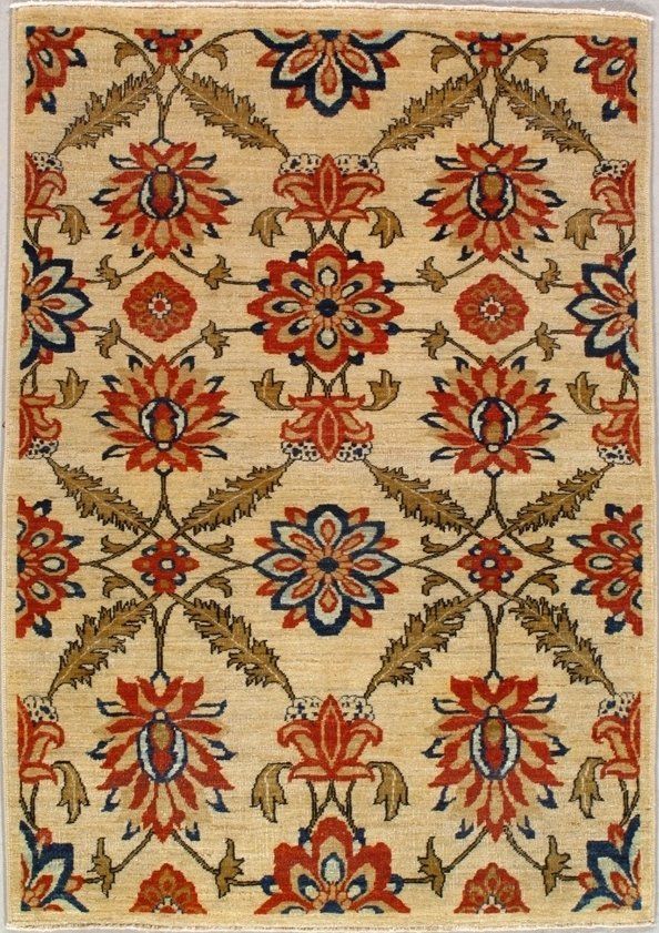 A rug with flowers and leaves on it