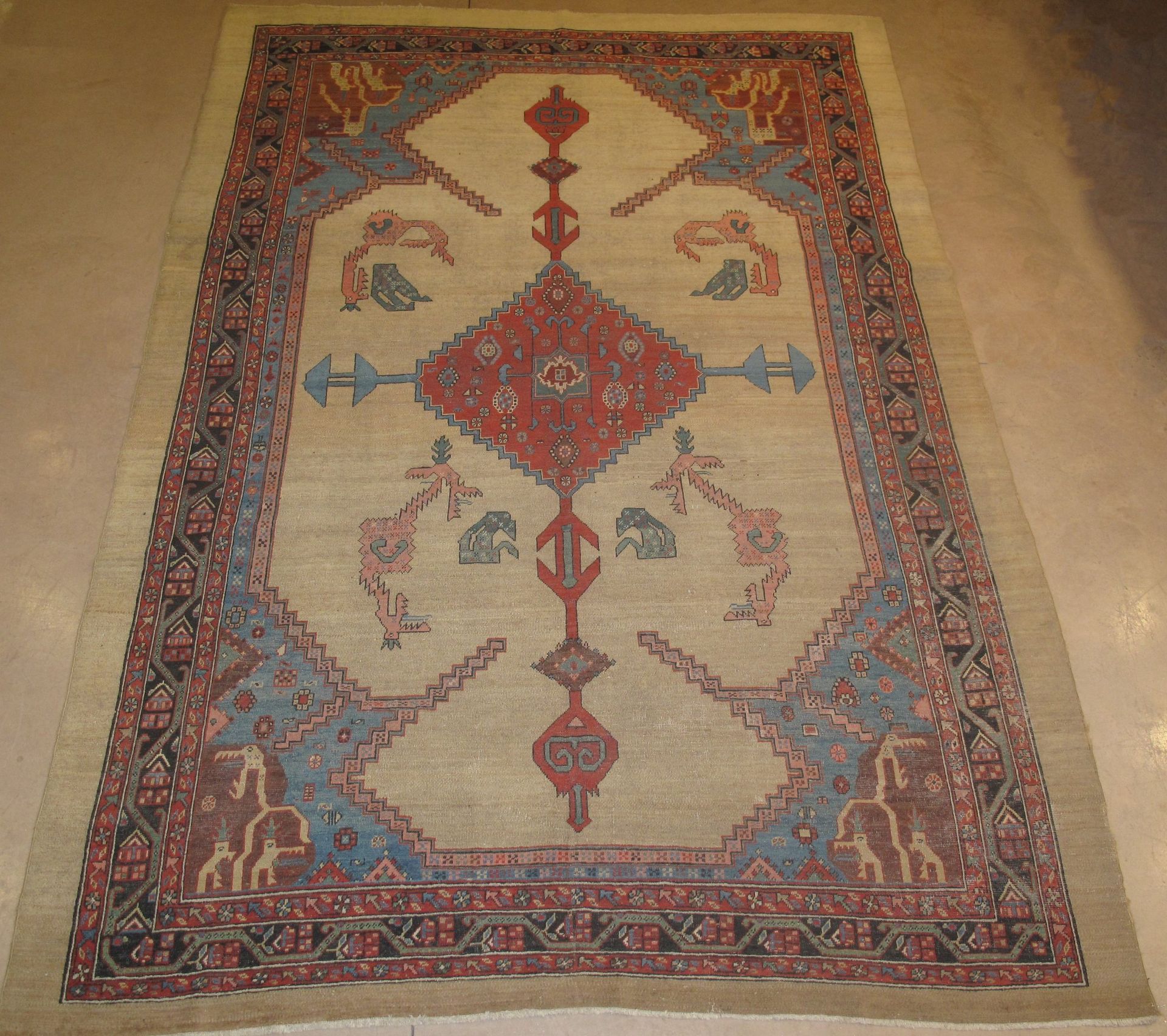 A rug with a geometric pattern and animals on it