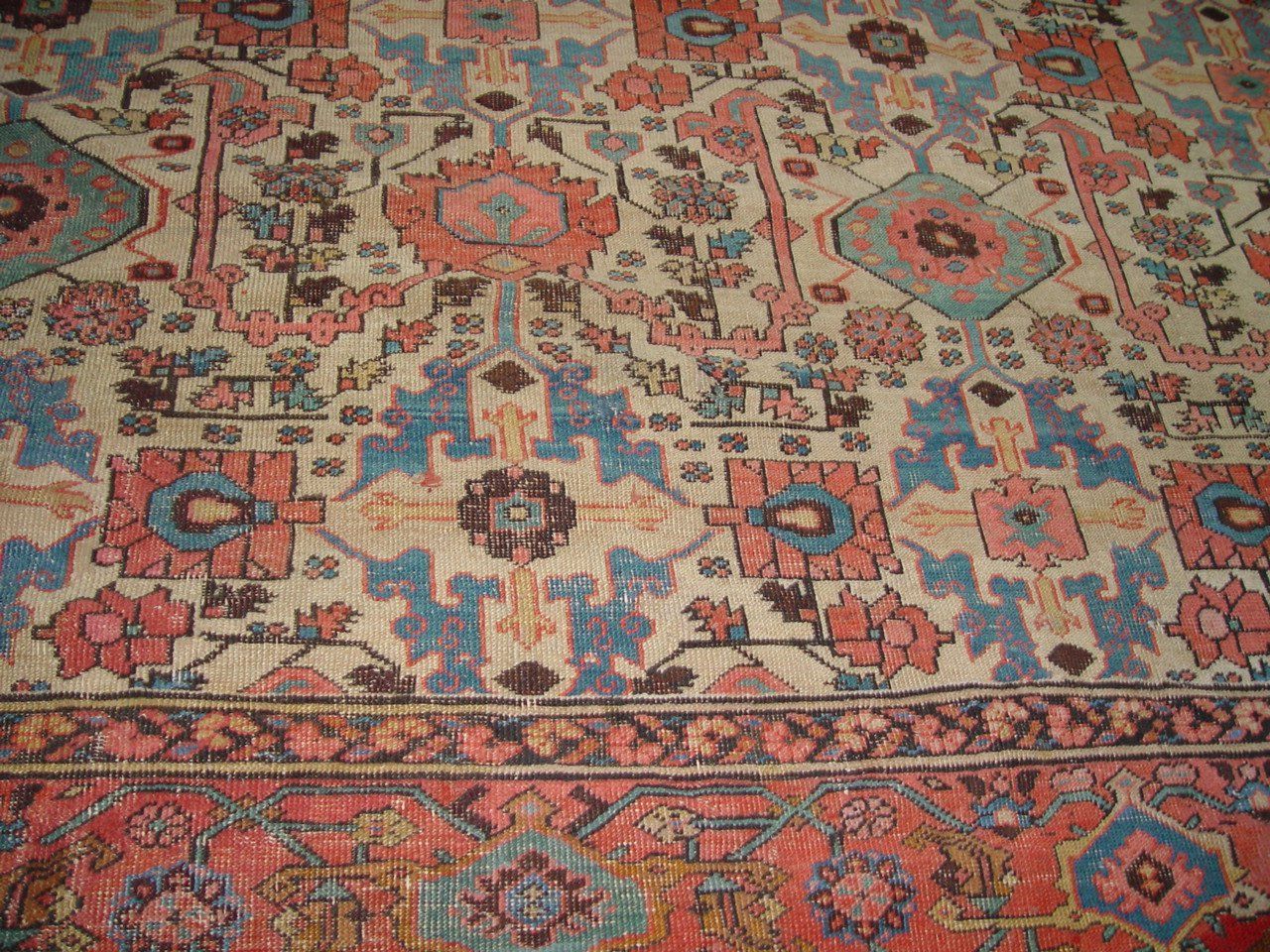 A rug that has a floral pattern on it