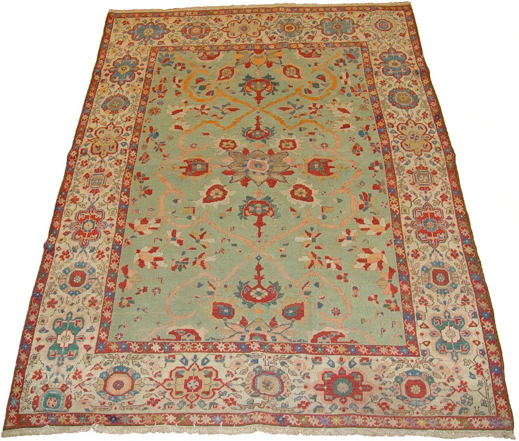 A large rug with a floral pattern on it