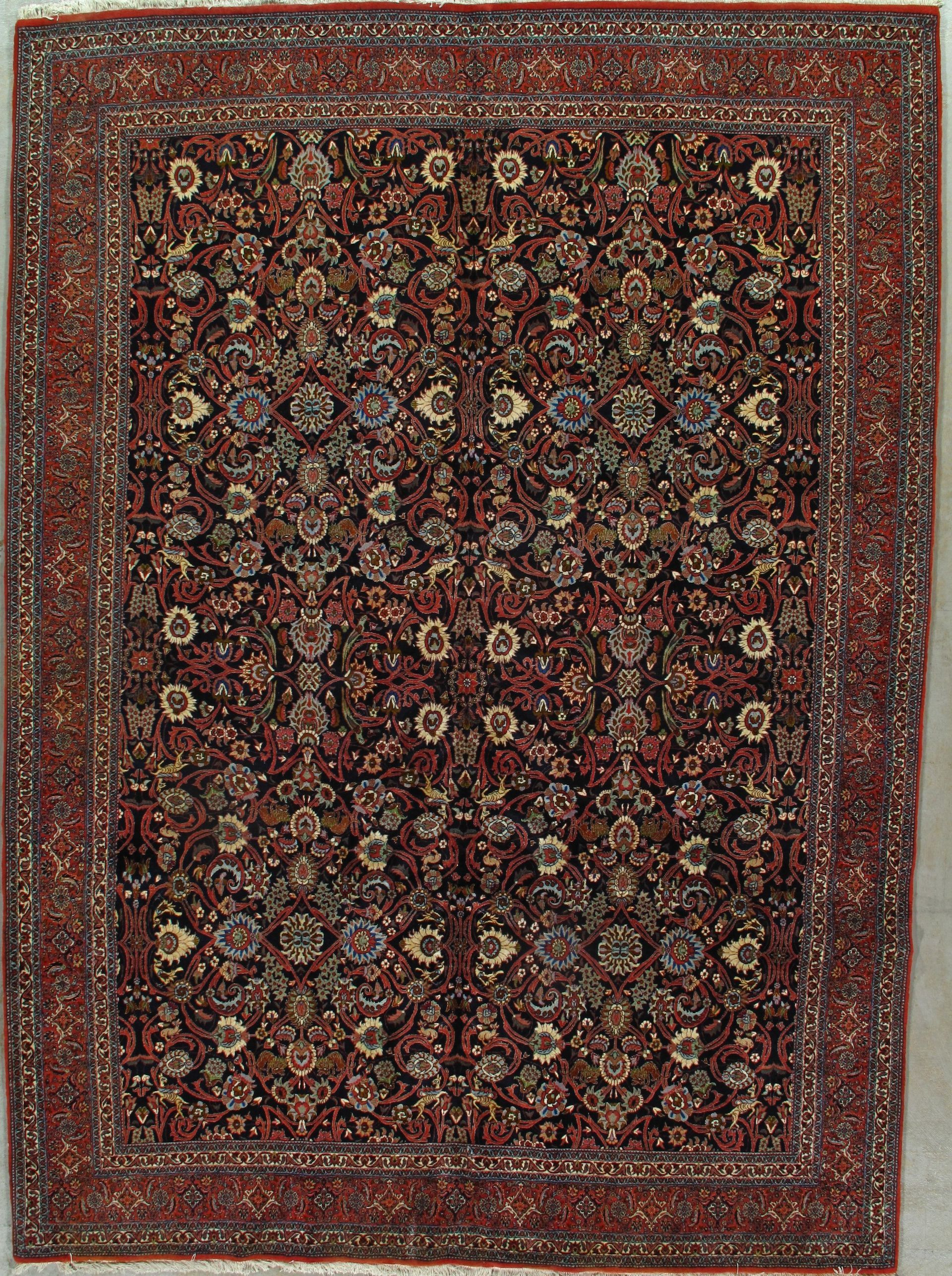 A rug with a floral pattern on it is sitting on a table.