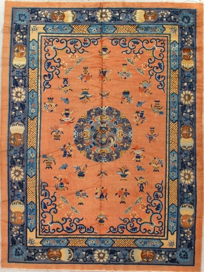 A rug with a blue and orange design on it