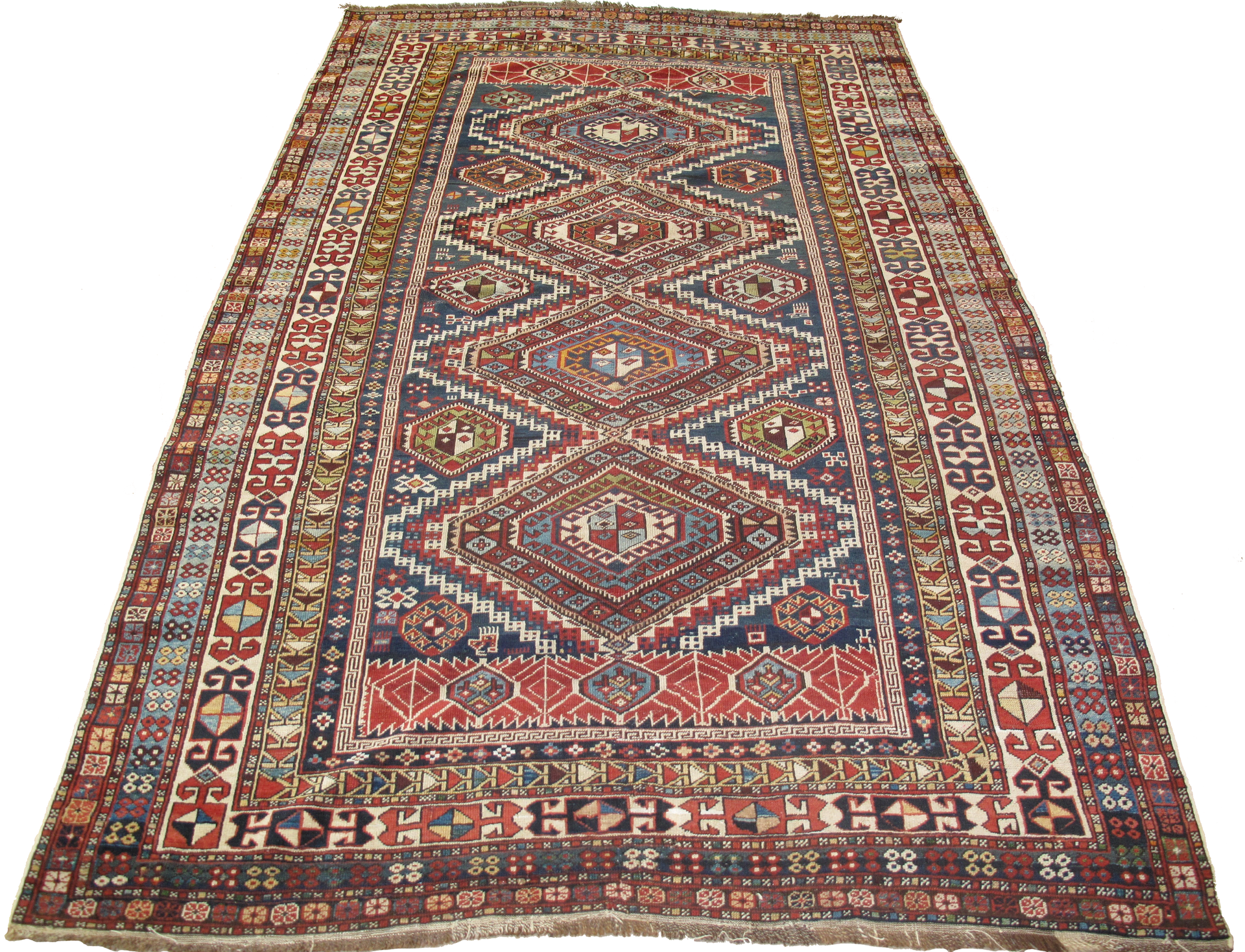 A rug with a geometric pattern on it is on a white background.