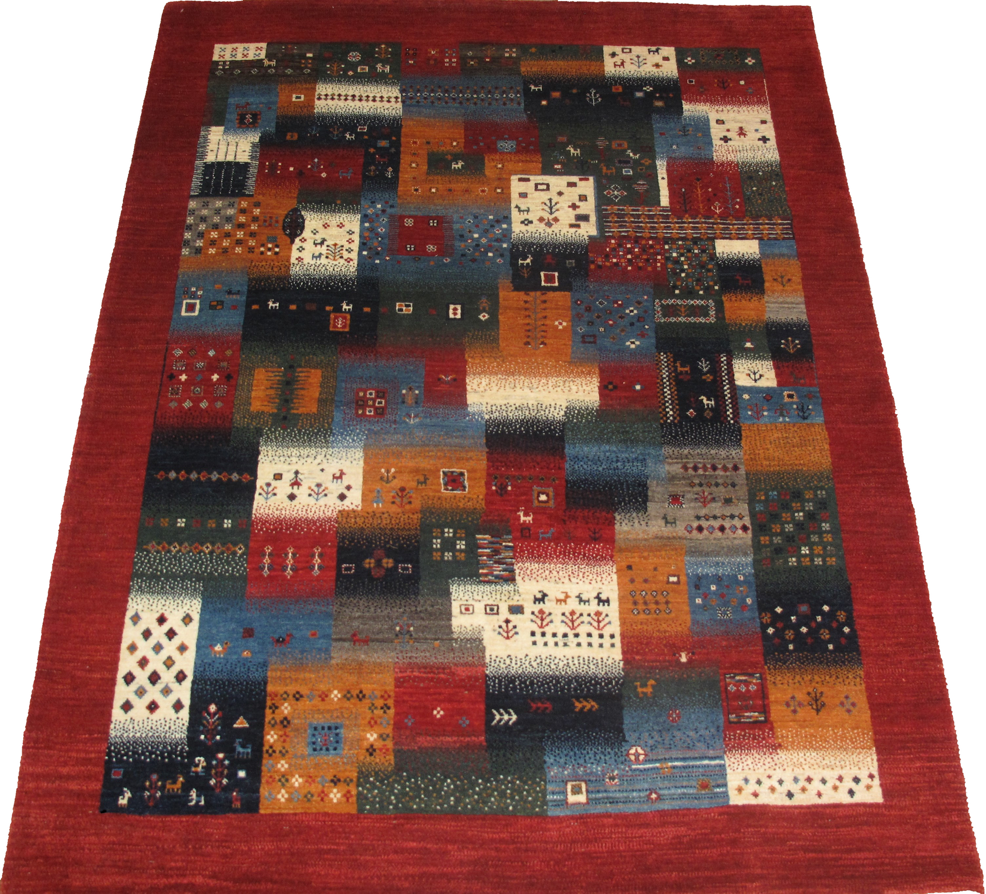 A rug with a red border has a geometric pattern on it