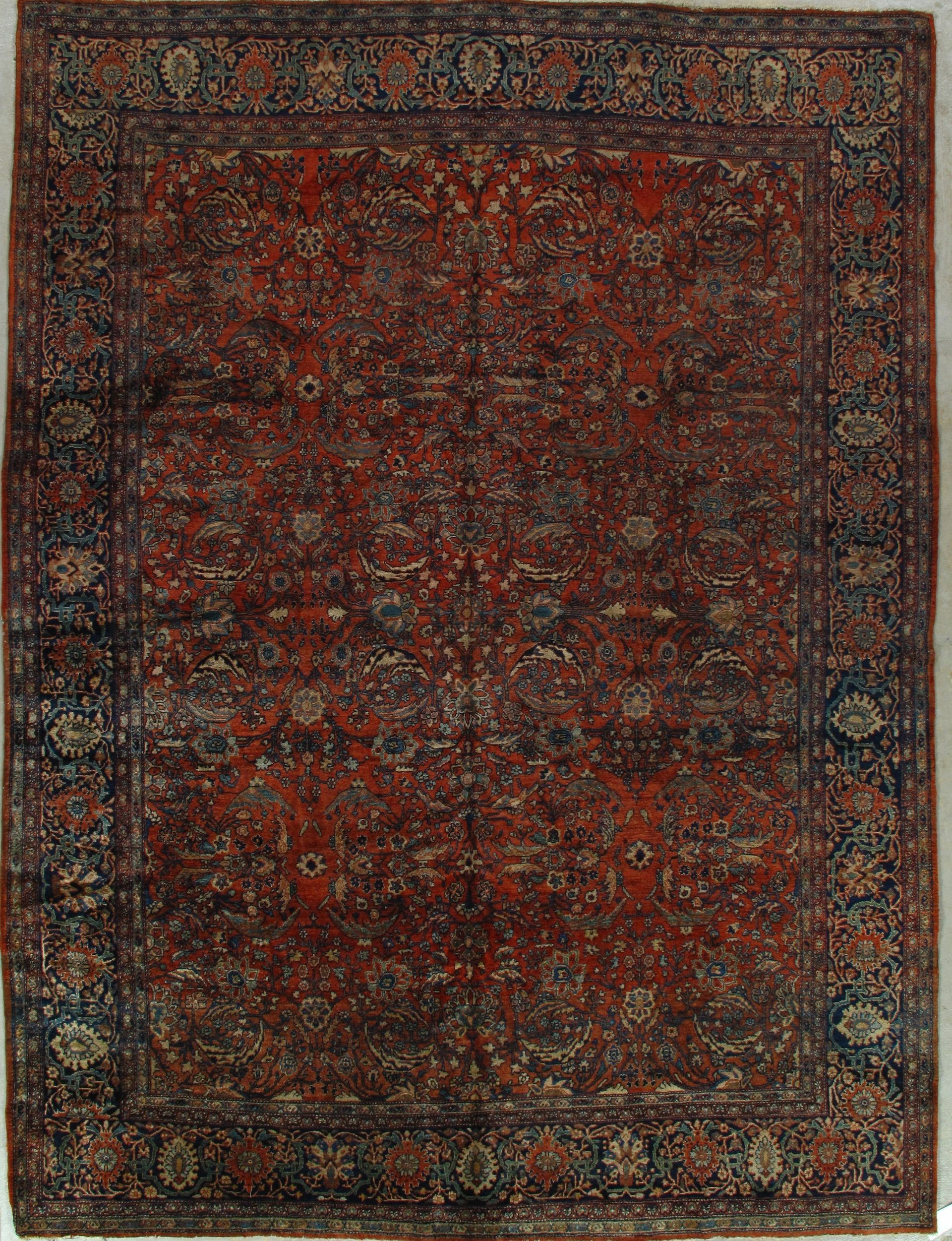 A rug with a floral pattern on it is sitting on a table.