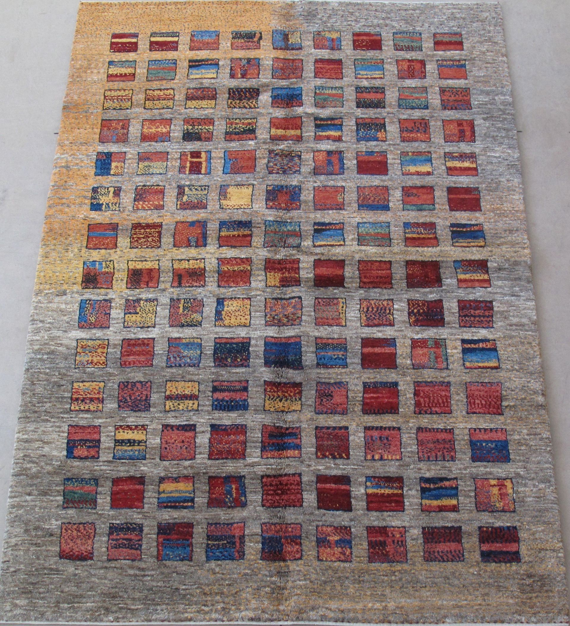 A rug with a pattern of squares on it