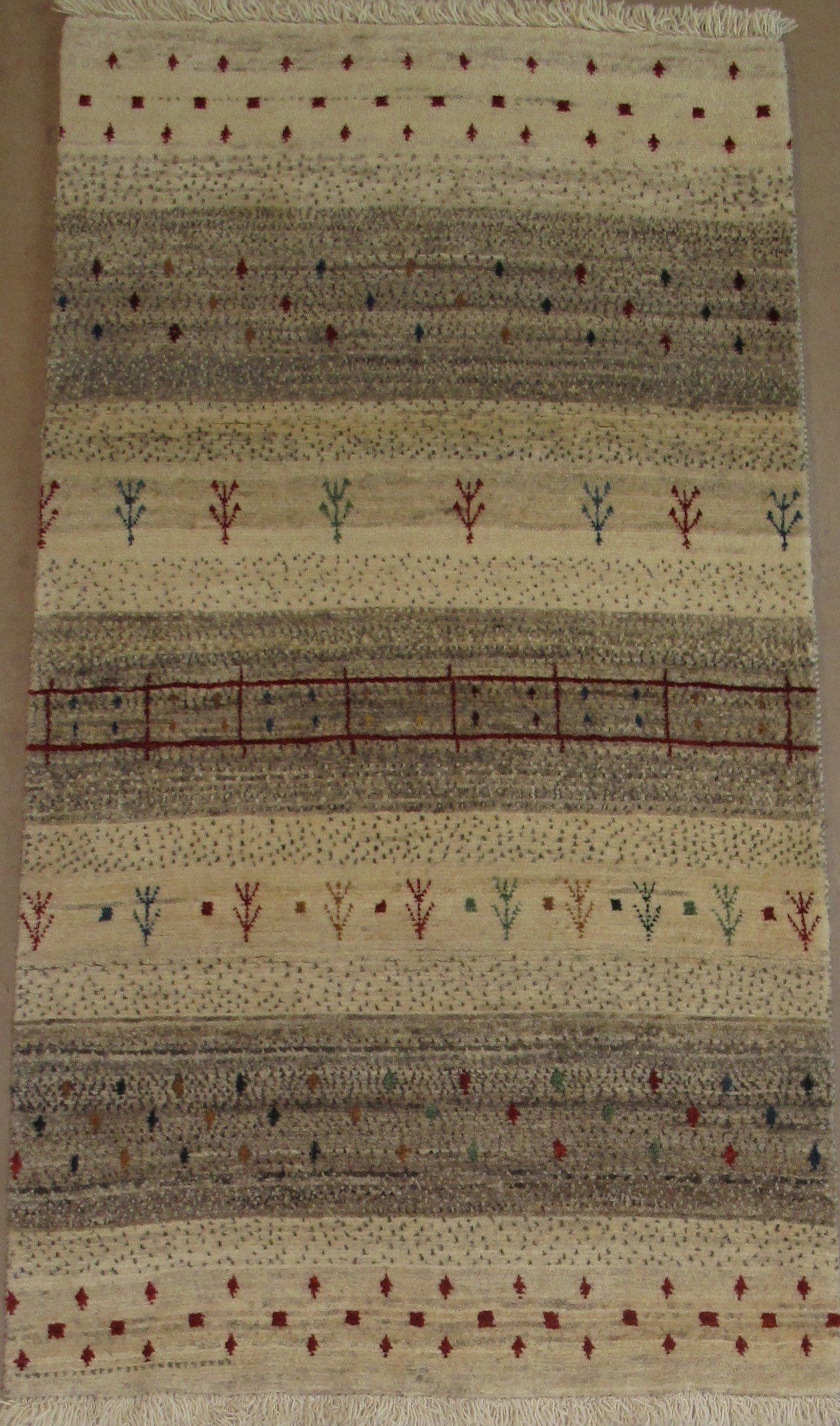 A rug with a pattern on it is sitting on a table.