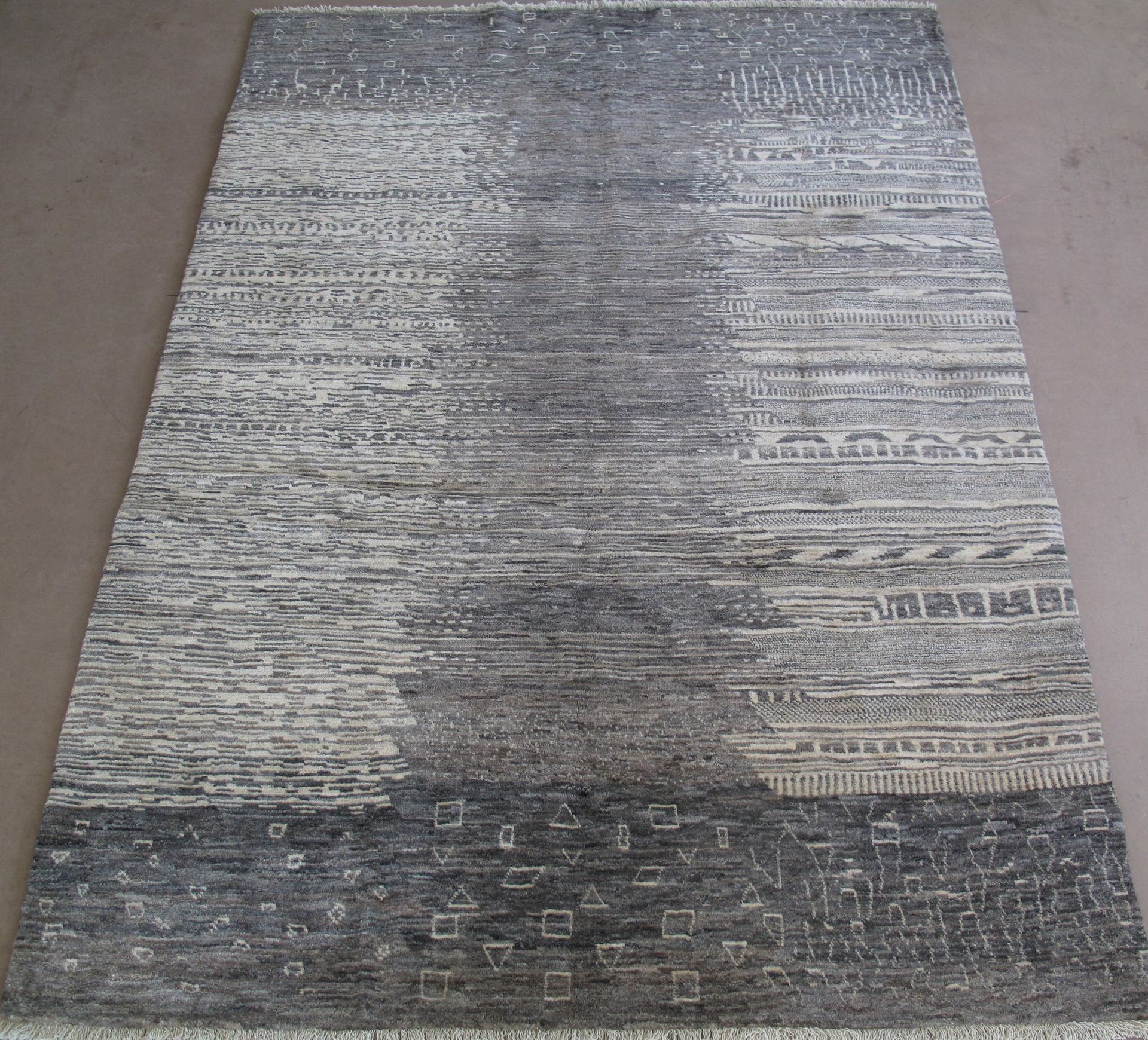 A rug with a brick pattern is sitting on a table