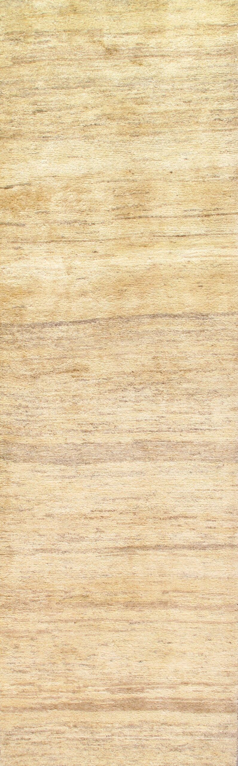 A close up of a piece of wood showing the texture of the wood.