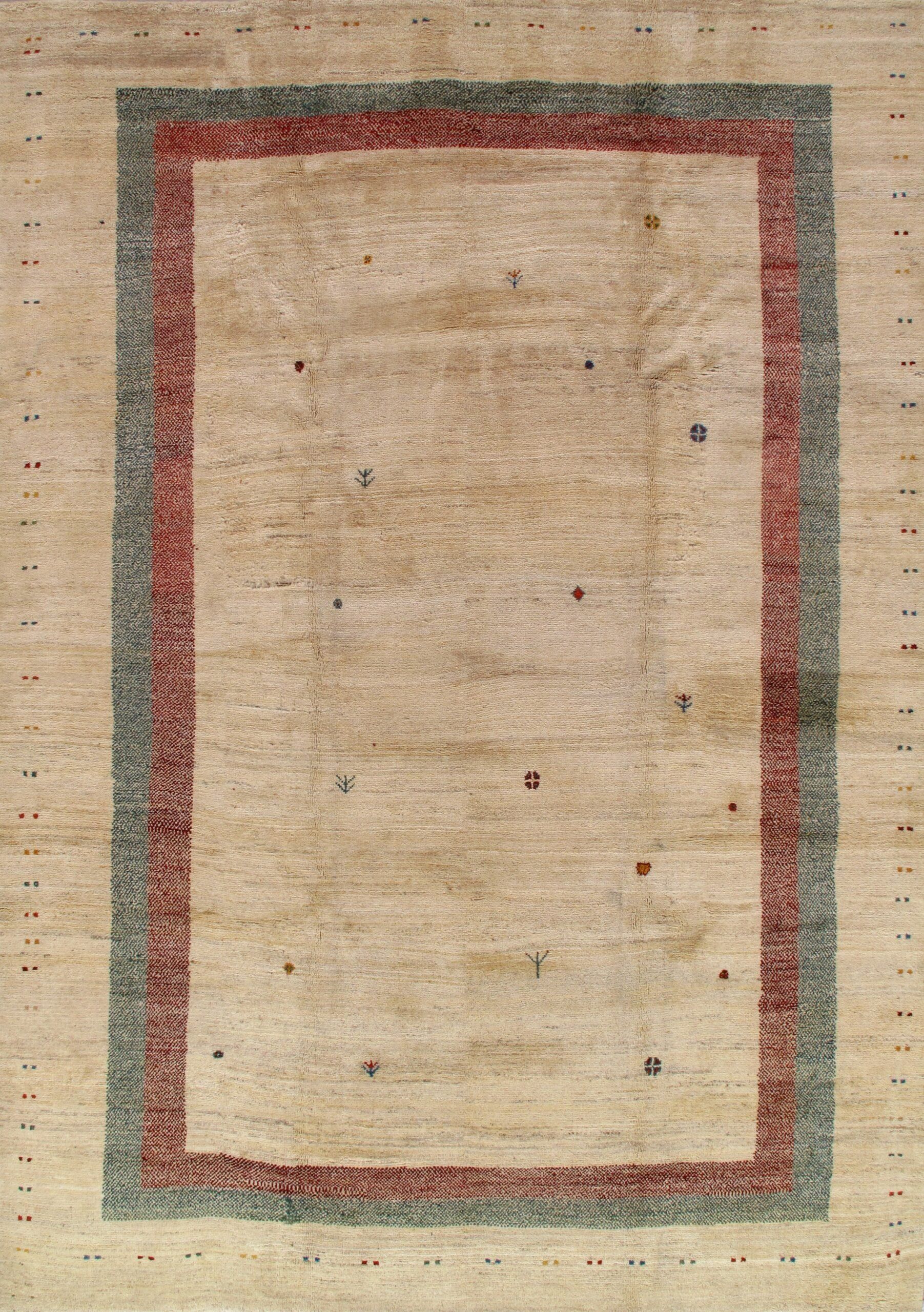 A beige rug with a red and blue border