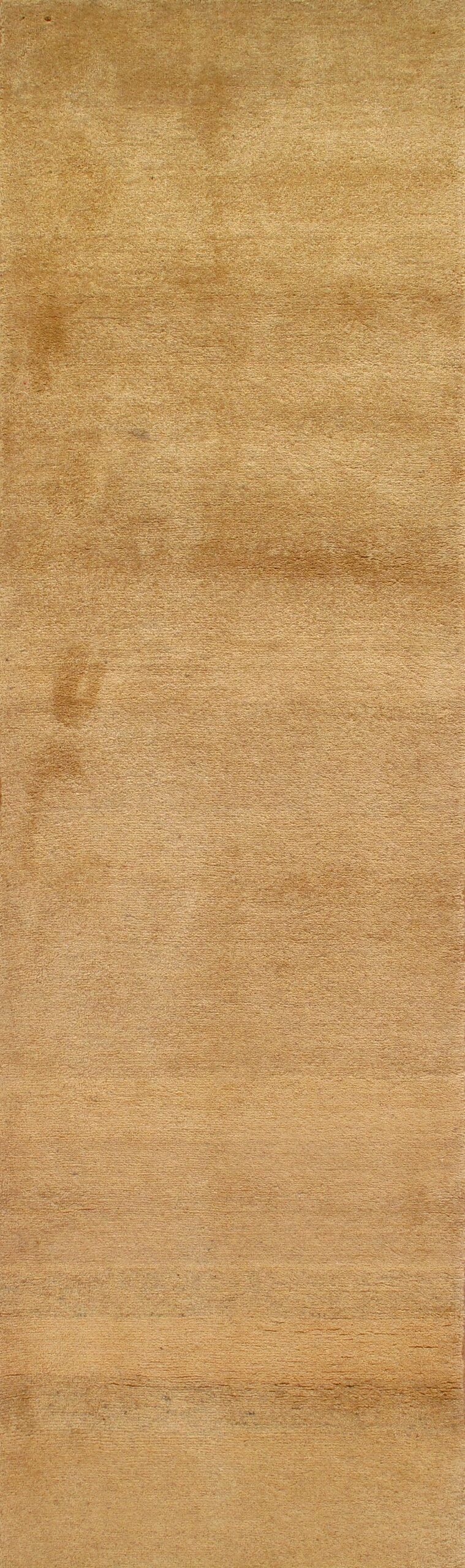 A close up of a piece of wood showing the grain and texture.