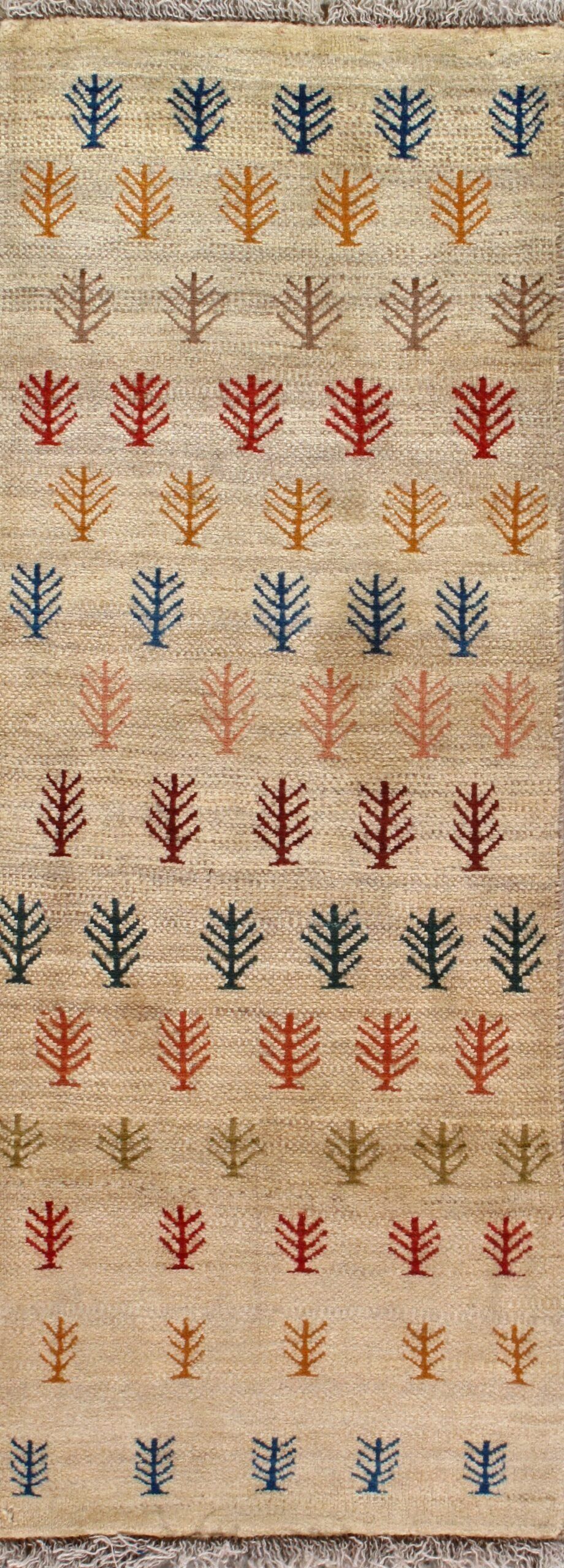 A rug with a pattern of trees on it.