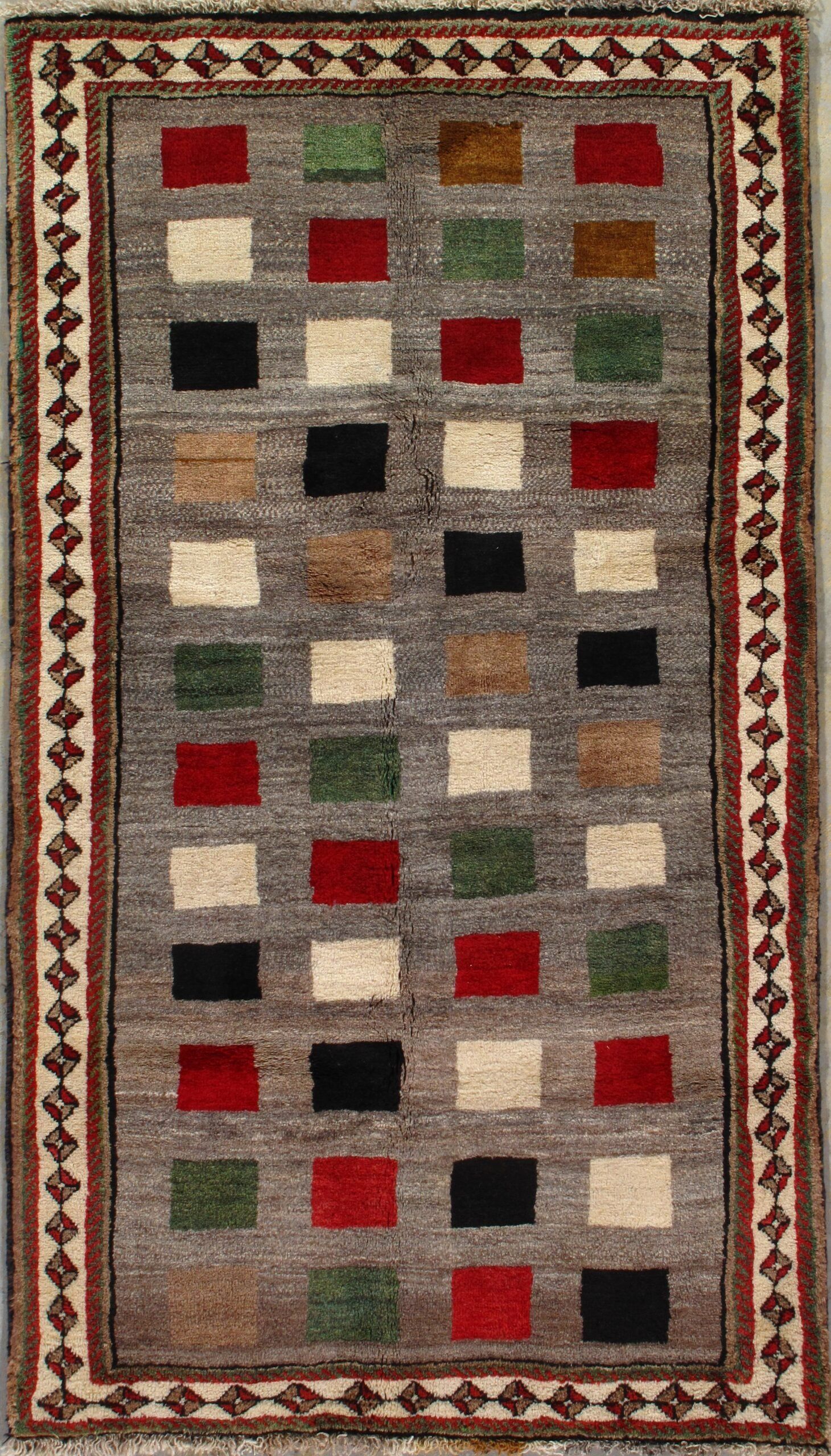 A rug with a pattern of squares on it